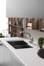 While it seems convenient, wiping off oil on granite countertops increases the risk of a larger stain formation. Get The Look Go For Bold Contrast With Colorful Composite Granite Sinks Kitchen Design Small Kitchen Design Refacing Kitchen Cabinets