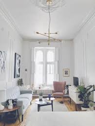 Living Room Lighting Fall In Love With This Amazing Living Room Chandelier And Get In Studio Apartment Decorating Apartment Interior Apartment Interior Design