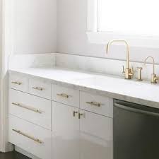 Croma Design Kitchens Glossy Cabinets Glossy Kitchen Cabinets White Lacquer Cabinets White Lacquer Kitchen Modern Kitchen Gold Kitchen Kitchen Hardware
