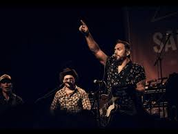 From Farmer to Chart Topper, Country Music Singer Logan Mize Is Doing It  His Way