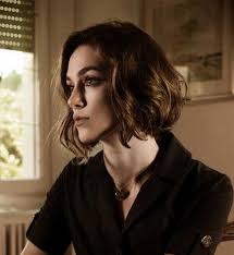 Apply a bit of styling wax to your fingertips and rake them through your bob to add more texture. Keira Knightley Side Swept Bob With Round Faces Fashion 2d