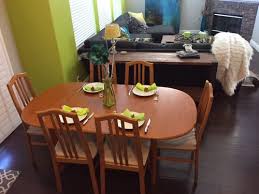 This rectangular dining table is crafted from a blend of solid poplar wood and veneers, and showcases a distressed white finish for a rustic touch. Danish Dining Room Table What Brand Wood Finish Is It