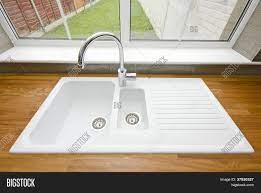 We can offer pretty much anything you can imagine that can be done with a wooden worktop. White Ceramic Kitchen Image Photo Free Trial Bigstock