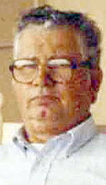 Raymond Rhoades, garage owner, dies at his home