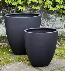 Our selection of outdoor planters and pots keep outdoor spaces looking fresh & vibrant. Black Round Frp Lobby Planters Fibrecrafts India Id 7856321673