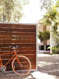 This attractive garden gate features slats mounted alternately on the front and back. 5 Favorites Modern Wooden Garden Gates Gardenista