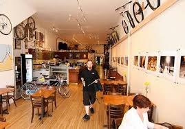 At One On One Bicycle Studio In Minneapolis One Barista Can Change A Flat In Three Minutes Boasts Owner Gene Oberpriller Bike Shop Bike Repair Bike