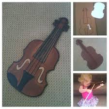Violin with cardboardlike / comment / share if you want me to send you pdf measurement so you can print and make it yourself exactly the same.material used:1. Pin Auf School