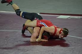 Burlington junior locks up 100th wrestling win, second Lowell title