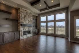Dave fox design build remodelers inspiration for a medium sized retro open plan living room in. High Ceiling Built In Great Room With Ceiling High Stone Fireplace Built In Cabinets And Great Rooms House Fireplace Built Ins