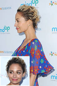 The hair around the crown is teased for an extra body, and the bottom hair is loosely twisted into a soft round bun, while the bangs are slightly curled to bring a playful element into the finished look. 13 Easy Updos For Short Hair Best Short Updo Hairstyles To Try