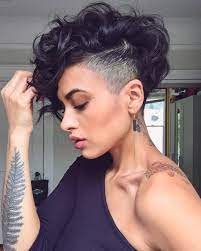 Shaved Hairstyles For Women Women With Naturally Curly Dark Brown Long Pixie With Side Shaved Hair Short Hair Undercut Curly Pixie Haircuts Thick Hair Styles