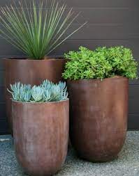 19 Super Chic Outdoor Planters That Will Make Your Plants Look Beautiful Than Ever Outdoor Garden Planters Outdoor Planters Container Gardening
