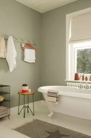 Pale Muted Greens Make For A Serene Bathroom Space Try Overtly Olive On Bathroom Walls With Splashes Of Brig Green Bathroom Serene Bathroom Painting Bathroom