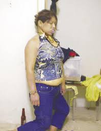 Corpse hanging in front of a hounted house. Two Female Hanged