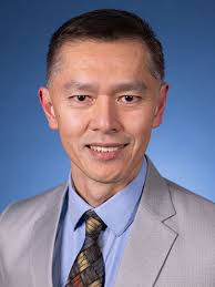 Dr. Douglas P. Dee Biography