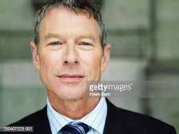 Businessman Smiling Portrait Closeup High-Res Stock Photo