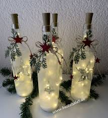 lichterglanz mit ein paar leeren weinflaschen ein paar led lichterketten und den stanzforme wine bottle crafts christmas christmas lights bottle bottle crafts