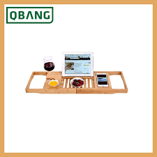 It has a wine glass holder, a perforated dish to hold soap, a book holder and hooks for hanging small cloths. China Modern Hot Amazon Bamboo Bath Caddy Bamboo Bathtub Caddy Tray Bathroom Serving Tray Bed Plate China Bathtub Board Bathroom Organizer