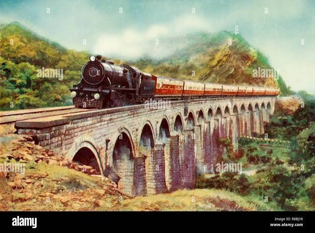 Between Bombay and Delhi. A striking view of the Frontier Mail passing over a viaduct', 1935 Creator: Unknown Stock Photo - Alamy
