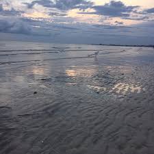 The Low Tide In The Evening Made Beach Walks With A Glass Of