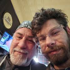 Greg died Saturday morning, September 6, 2025, at home, under hospice care,  beside his wife, after 22 months of battling pancreatic cancer.