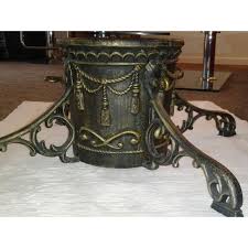 A revolving stand can highlight stunning glass christmas ornaments or vintage christmas ornaments that deserve flaunting and add an elegant, unique touch to your christmas décor. Vintage Cast Iron Christmas Tree Stand Chairish