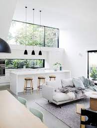 Clean Open Space White Kitchen And Living Room With Black Decor Minimalism Interior House Interior Interior Design