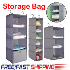 Available at every location of @thecontainerstore and the container store custom closets. Hanging Wardrobe Organizer Storage Bag Closet Shelf Cloth Hanger Rack Container Hanging Organizers Aliexpress
