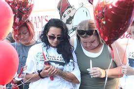 VIDEO: Prayers, candles hold up the Mason, Saada families