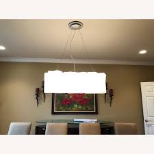 Logico mini & classic ares now available in three color options : Artemide Logico Suspension Triple Linear Aptdeco
