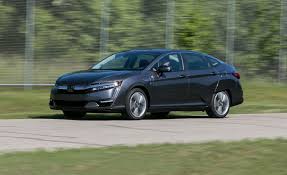 Looking at the 2018 honda clarity vs. 2018 Honda Clarity Plug In Hybrid Tested Honda S Sci Fi Future