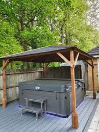 An outdoor hot tub is definitely a really cool feature and while the tub itself requires plenty of planning and designing, so does the area around it. Hot Tub Shelter Ideas Wooden Gazebos Dunster House