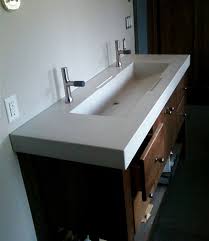 Like our name suggests, we are kitchen and bathroom specialists but also perform other types of home renovations such as custom cabinetry for entertainment units and closets. Hand Crafted Custom Concrete Sinks By Masonry And Metal L P Custommade Com