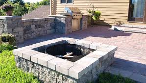 We have posts collecting great ideas for patio fire pit designs and things to consider with backyard fire pits as well as outdoor fireplaces. Square Firepit Firewood Patio Wall Paver Patio Bbq Grill Fire Pits Fireplaces Outdoor Cooking Bbq Pa Outdoor Fire Fire Pit Backyard Outdoor Fire Pit