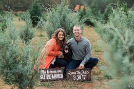 Whether you want to head out to the field and cut your own christmas tree, or you prefer to. Julie Kyle Christmas Tree Farm Engagement Photography Enmuse Photography