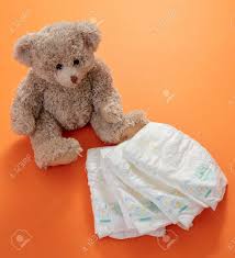 Check spelling or type a new query. Baby Diapers And Cute Teddy Bear Sitting On Orange Color Background Newborn Nappies Concept Stock Photo Picture And Royalty Free Image Image 163215925