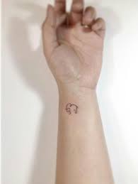 This Is An Amazing Mini Elephant Tattoo Design On Wrist Elephant Tattoos Give Elegance Beauty An Tiny Elephant Tattoo Elephant Tattoos Elephant Tattoo Design
