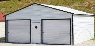 Metal Garage Kits By Hippostructures Com This 2 Car Garage Is White With Black Trim Perfect Backy Backyard Storage Buildings Portable Garage Backyard Storage