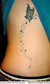 Butterfly Trailing Stars Tribal Butterfly Tattoo Butterfly Tattoo Rib Tattoo
