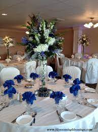 Pin By Ashley Crosse On Blue Wedding Flowers Blue Wedding Decorations Royal Blue Wedding Decorations Royal Blue Centerpieces