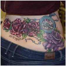 Showing a lower back tattoo in public by wearing a low cut jeans and crop tops attracts attention. 19 Lower Back Tattoos That Are Anything But Tramp Stamps Revelist