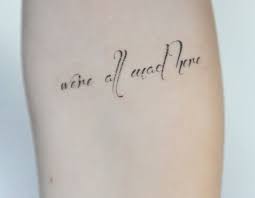 We Re All Mad Here Tattoo Quotation From Alice In Wonderland Tattoo Quotes Short Quote Tattoos Wonderland Tattoo