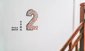 the second pattern is step by step pattern which is the regular geometric pattern that promot environmental graphics signage signage design wayfinding signage