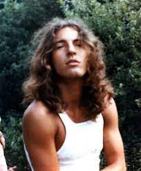 Bruce springsteen knew… on the road the sun is sinking low…there's bodies hanging in the trees…this is what will be…this is what will be… b. A Long Haired Bruce Springsteen During His Days As A Member Of The Band Called Steel Mill In 1970 Bruce Springsteen Musician Singer
