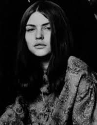 I found this old photo of John and Yoko in New York City getting a hot dog.  I don't know what street this was, but I know they lived near Central Park