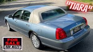 Image result for Light Ice Blue 2009 Town Car