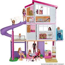 The clear plastic walls have a floral design at the base of them, and a curved door that slides in a track. Barbie Dream House Dollhouse W Pool Slide Elevator Fhy73 Barbie