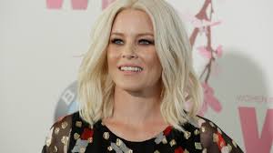 American actress, director, and producer. She is known for playing Effie  Trinket in "The Hunger Games" film series and Gail Abernathy-McKadden in  the "Pitch Perfect" film series. She made her directorial film