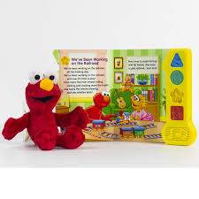 Zoe says (2nd version) in a remake of a previous sketch, zoe plays a game with elmo called zoe says, and accidentally causes elmo to fall off the wall. Sesame Street Elmo Is My Friend Sing Play Song Sound Book And Elmo Plush Pi Kids Eric Rose Wage Editors Of Phoenix International Publications Tom Brannon Tom Brannon